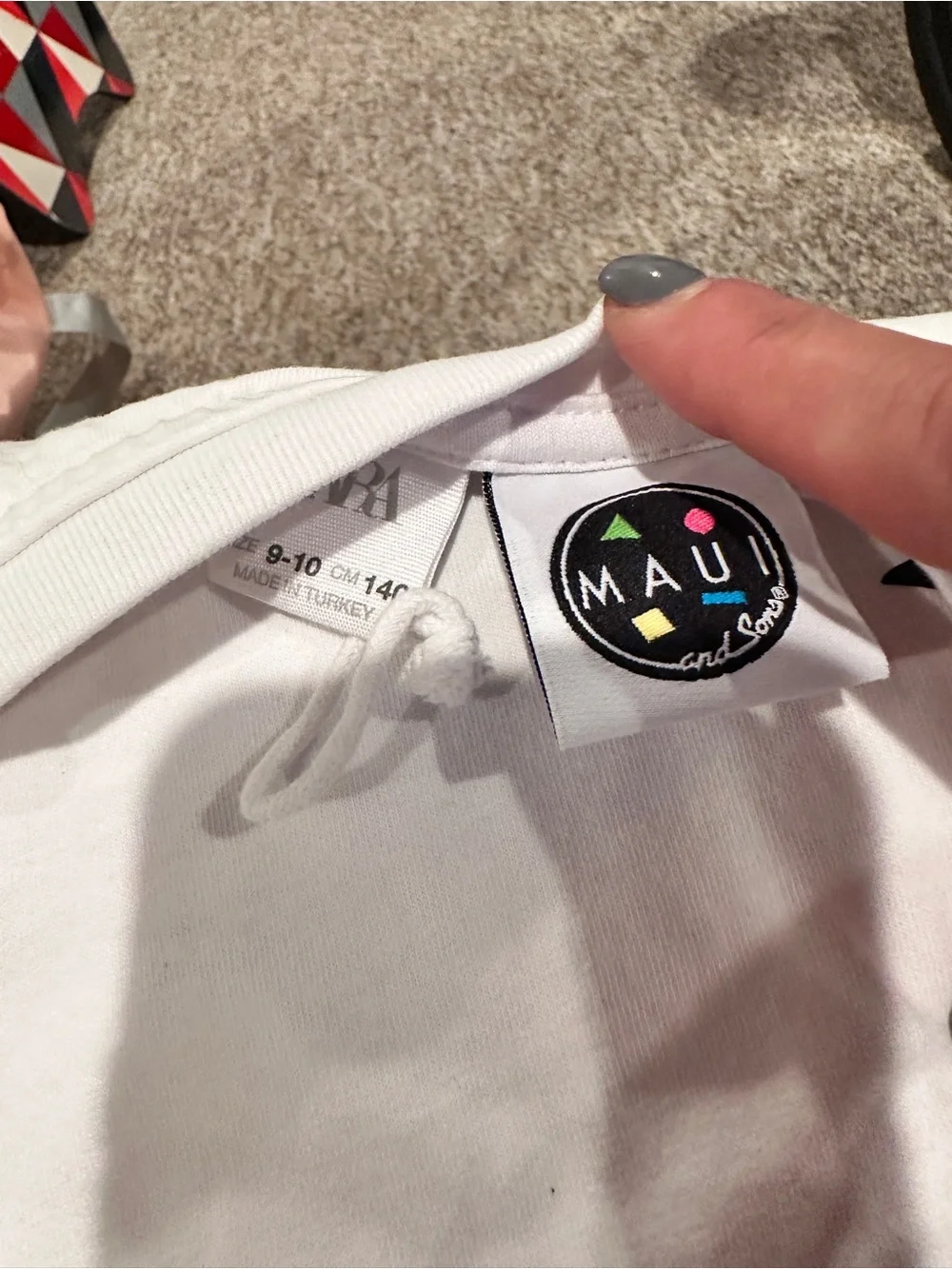 Zara t shirt size 9-10 and shorts size 11-12. White with Maui logo design